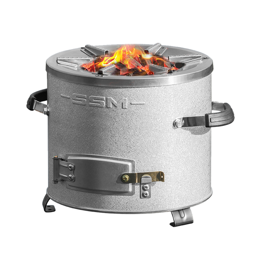 C26-10B aluminized zinc plated charcoal stove burning hot embers, demonstrating highly efficient combustion that reduces indoor air pollution and CO2 emissions.