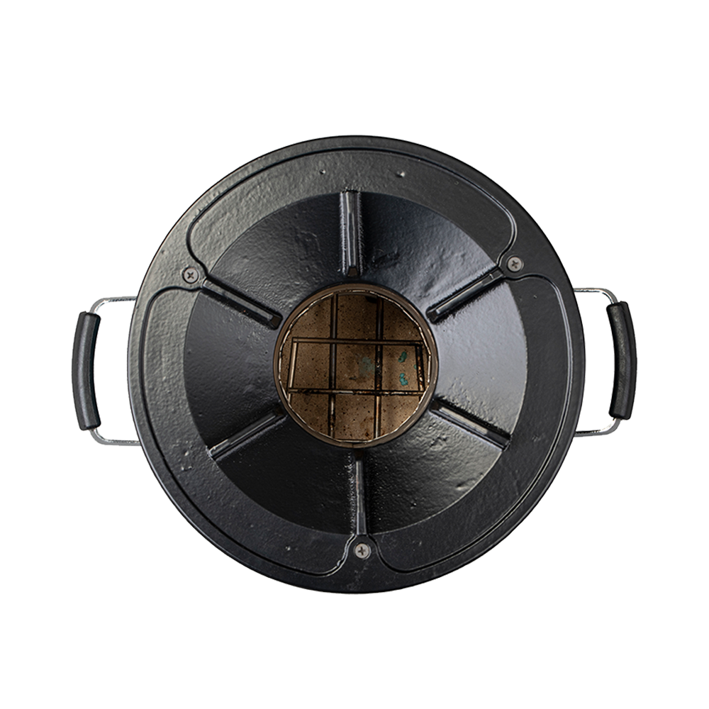 Top-down view of the teal S26-13 stove, showcasing the burner surface design for pots and pans.