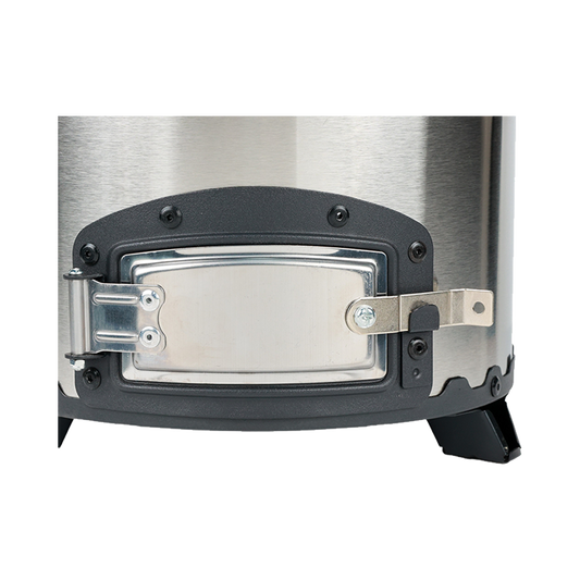 Close-up view of the reinforced stainless steel fuel door latch mechanism on the C26-10B charcoal stove, designed to seal the chamber and reduce fuel consumption by 46%.