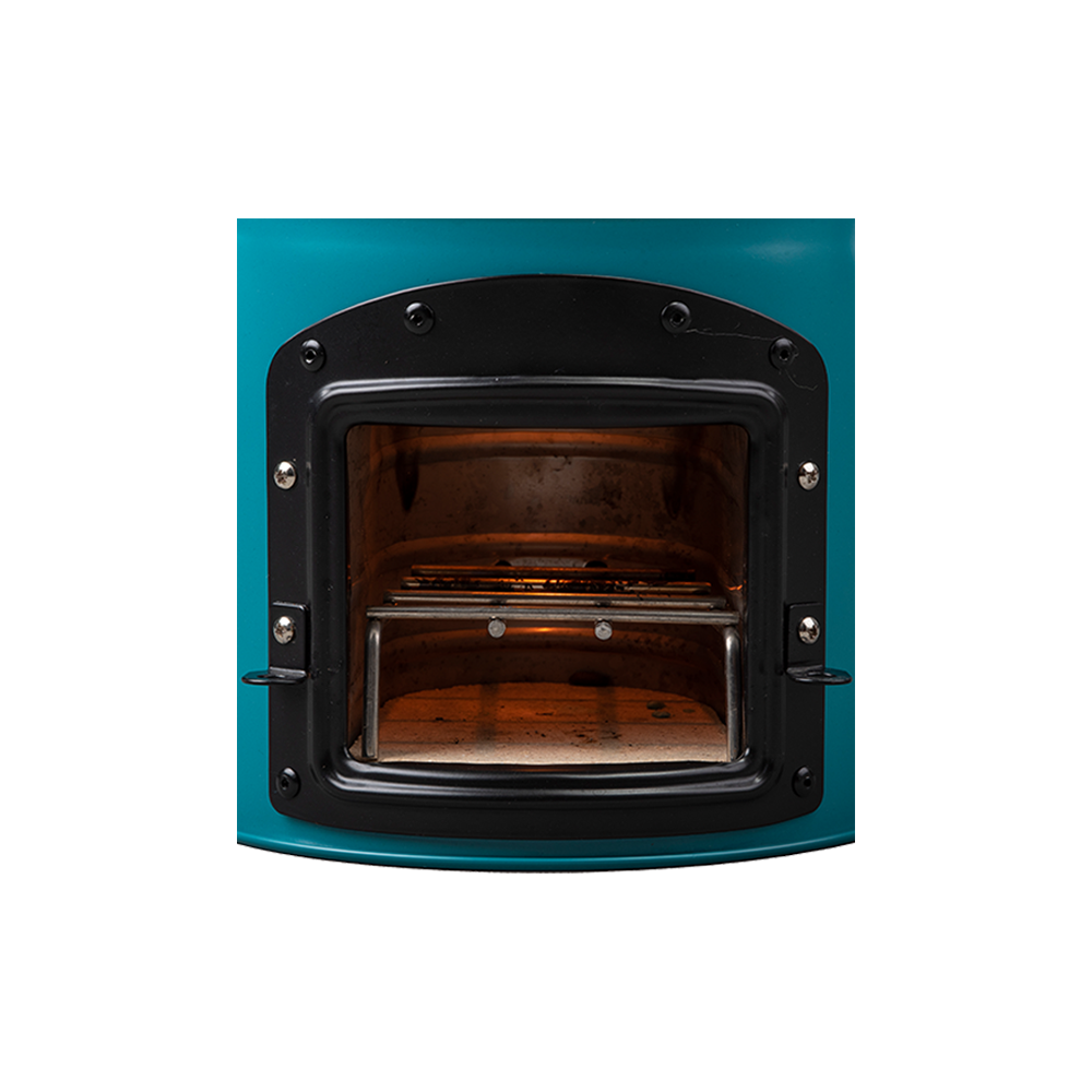 Close-up of the front loading door on the teal S26-13 stove, showing the interior combustion chamber and stick support system.