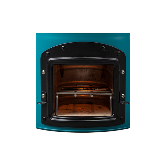 Close-up of the front loading door on the teal S26-13 stove, showing the interior combustion chamber and stick support system.