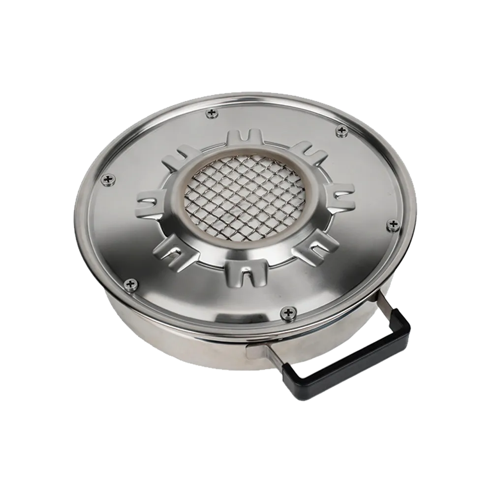 Close-up of the ES320 replaceable burner core and stainless steel shell with a heat-resistant handle, designed for easy maintenance and safe operation.