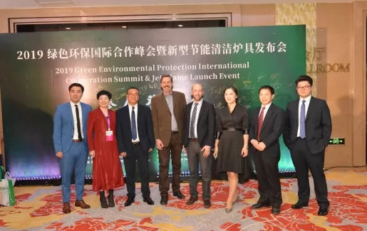 A group photo of the SSM team with the organizers at the 2019 Green Environmental Protection International Cooperation Summit - New Energy-Saving and Clean Stove Launch Event.
